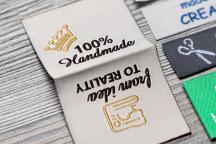 Flexinera fabric label with center fold and '100% Handmade' text - Item no. 3002