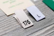 Sample set with size labels for textiles, shown with example sizes 176 and L - Item no. 3006