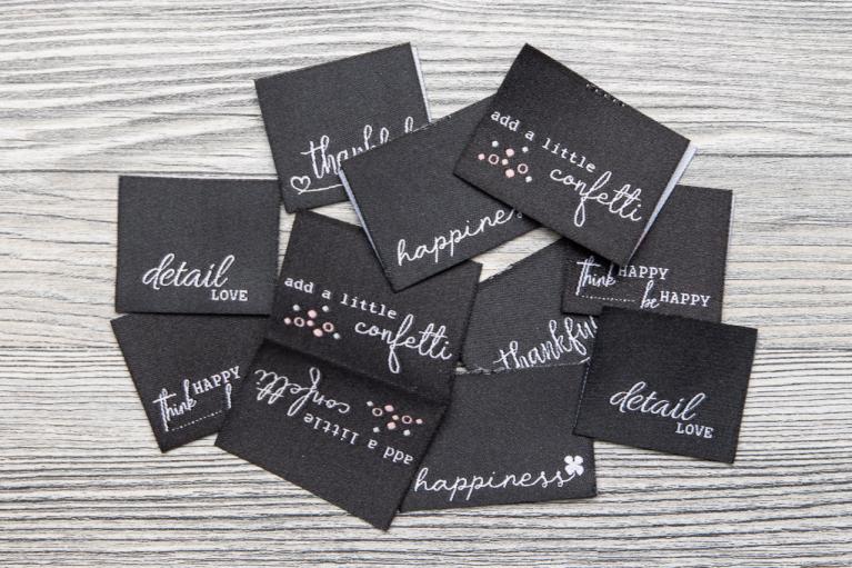 Designer set of woven labels \"happiness black and white\" by Unikati (Item number 9118)