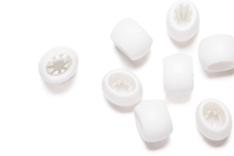 White plastic sliding locks used for wristbands for events   (Item number 2810)