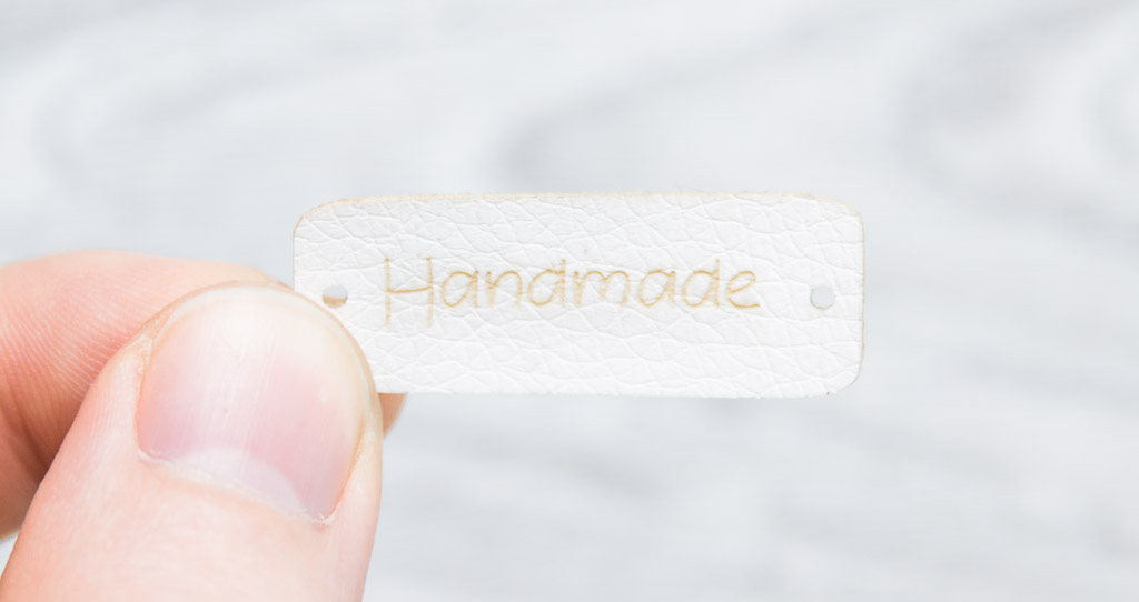 Synthetic leather label in white